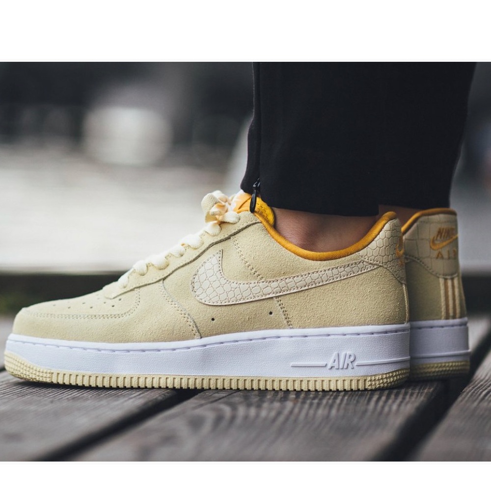 Nike Women’s Low-Top Sneakers in Cream and Yellow